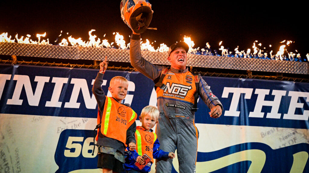 Hoffman and kids in Victory Lane