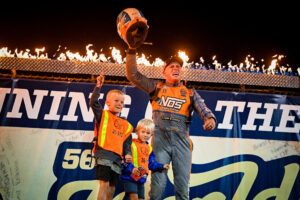 Hoffman and kids in Victory Lane