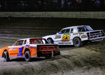 Dustin Turnage Sr and Willy Cuddy racing into Turn 1