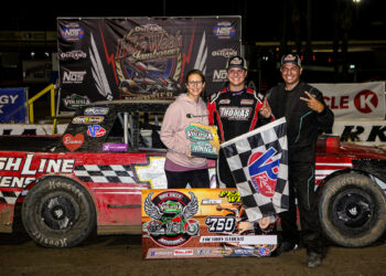 Thomas family smiles for Victory Lane