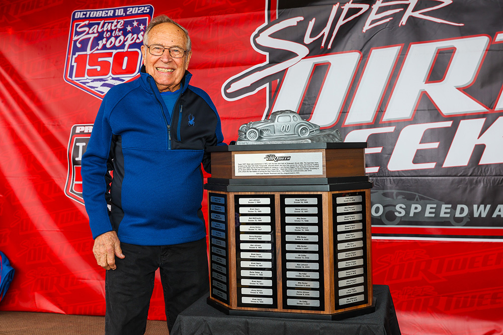 Buzzie Reutimann with the Emil Lloyd "Buzzie" Reutimann trophy