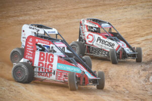 Alex Karpowicz, Trevor Cline, and Colton Robinson racing