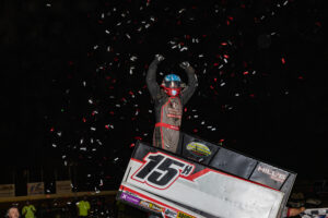 American Sprint Car Series driver Sam Hafertepe Jr. celebrating in Victory Lane at Windy hollow Speedway