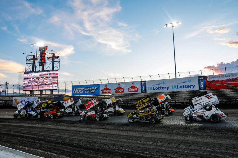 Sprint Cars lined up on the track at Knoxville Raceway, ready to start a Heat Race at the 360 Knoxville Nationals