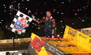 Blake Hahn celebrates in Victory Lane at Creek County