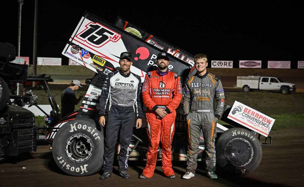 Podium posing in front of Hafertepe's car