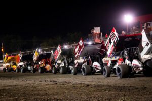 Sprint Cars in line across RPM Speedway frontstretch