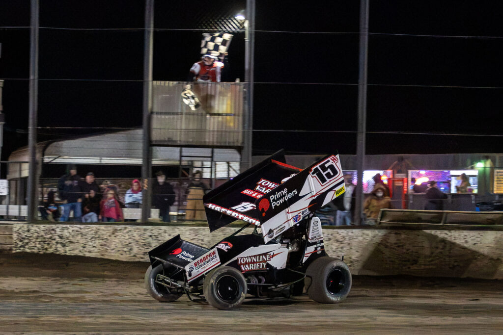 Sam Hafertepe's car crossing the checkered flags